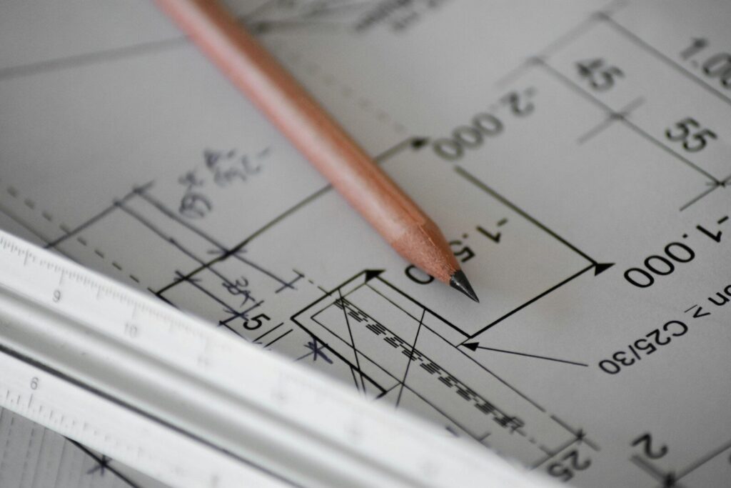 Technical drawing with dimensions, pencil and ruler