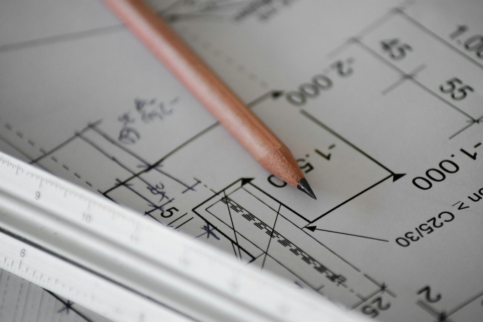Technical drawing with dimensions, pencil and ruler
