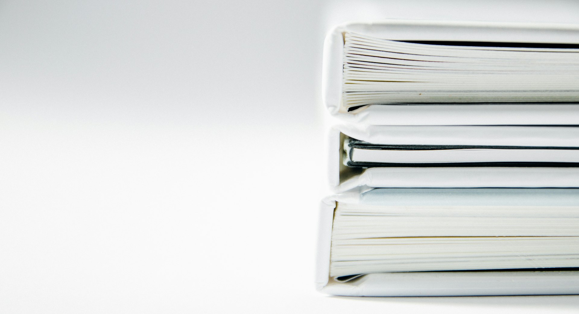 Stack of document binders ready for a UKCA gap assessment
